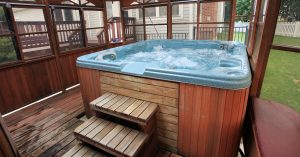 A luxurious hot tub in a Tucson backyard, showcasing relaxation and hydrotherapy benefits