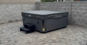 Premium hot tub with insulated cover in Las Vegas backyard under desert sun