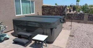 Premium insulated hot tub cover in a Goodyear Arizona backyard under bright desert sun