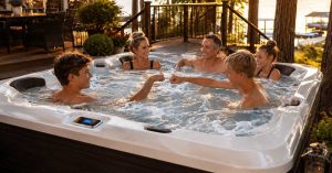 Family enjoying a spacious premium outdoor hot tub